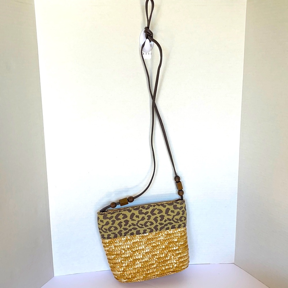 Leopard print and straw handbag.